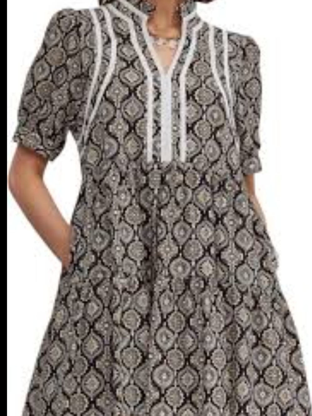 Entro Katrina high-neck babydoll dress featuring a blue and white paisley